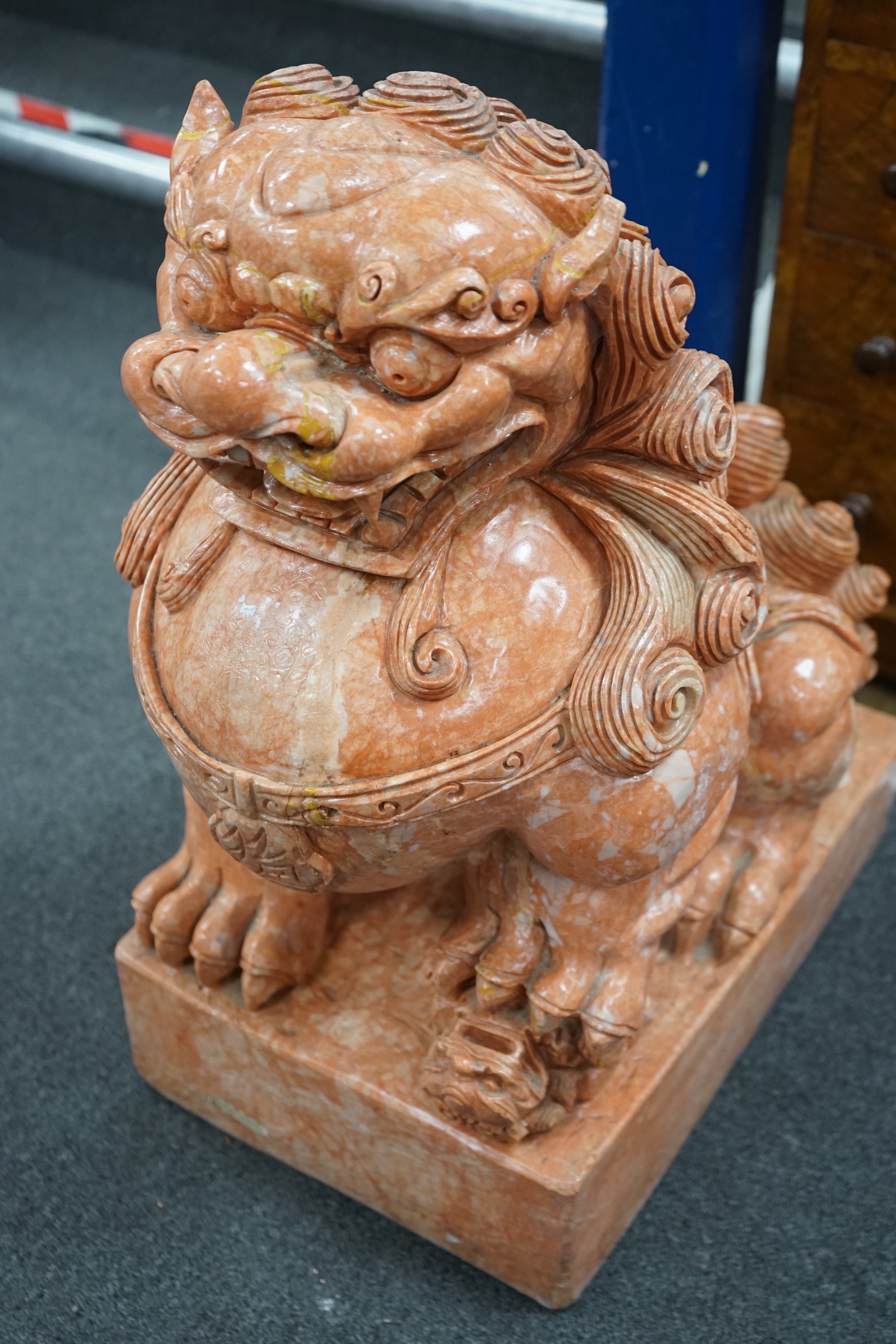 A pair of Chinese carved marble dogs of Fo, width 31cm, height 61cm